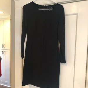 Black fitted dress w/ covered button sleeve detail
